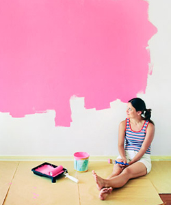 rby-woman-painting-wall-pink-lgn